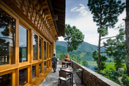 terrace dining with staff at uma punakha hotel bhutan