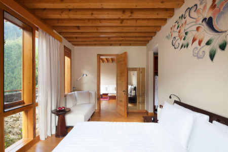 como villa master bedroom at uma punakha hotel bhutan
