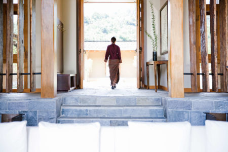 view from living room to main entrance at uma punakha hotel bhutan