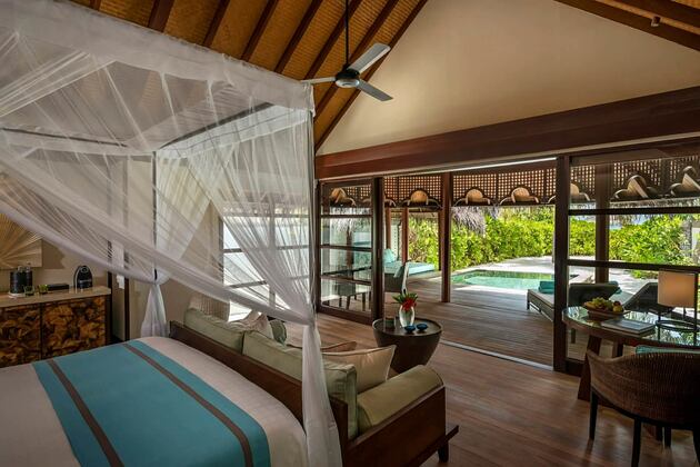 bedroom at four seasons kuda huraa resort maldives