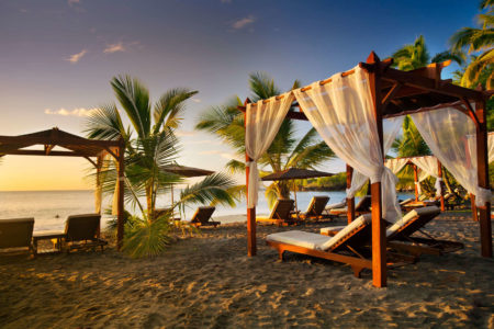 beach and pergolas at ti kaye resort and spa jamaica