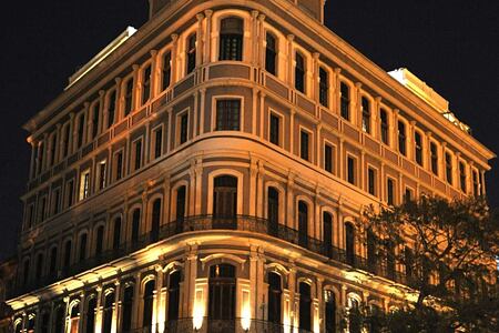 Nightime facade of Hotel Saratoga Cuba