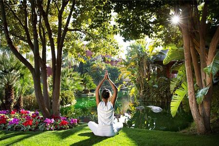 lady doing yoga at Asia Gardens Hotel Spain