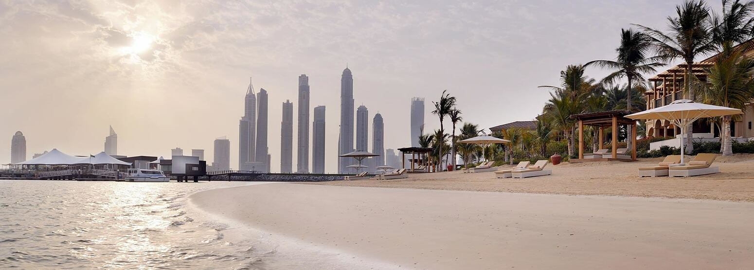 Beach with city at One and Only The Palm Dubai