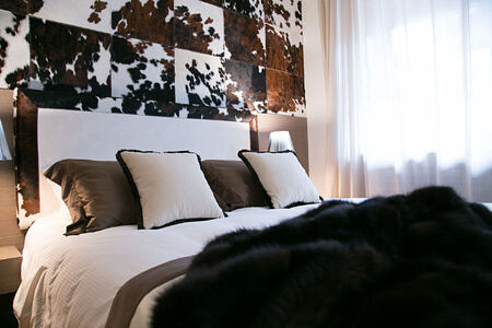 Headboard in Cowhide Bedroom at Hotel Ambra Italy
