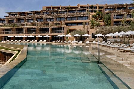 The pool and the hotel in the header image for Six Senses Ibiza